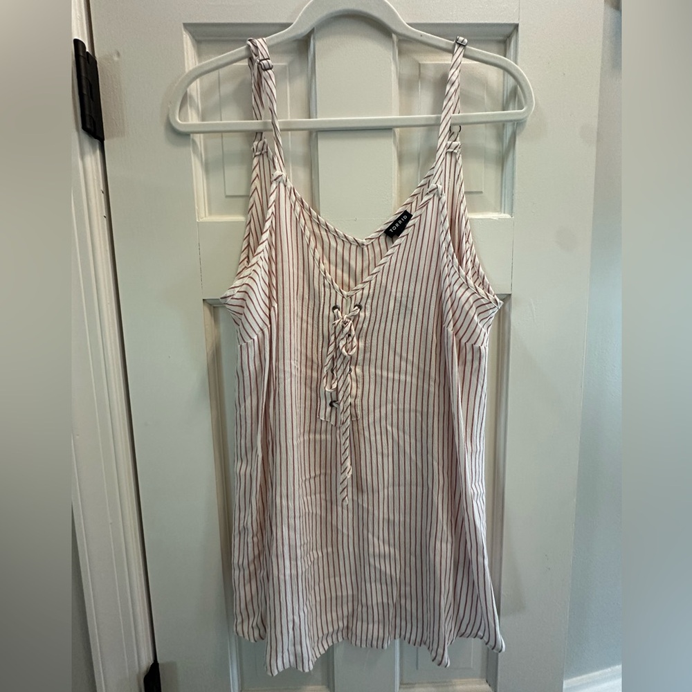 Torrid women’s tank top, size 00. Striped red and white.